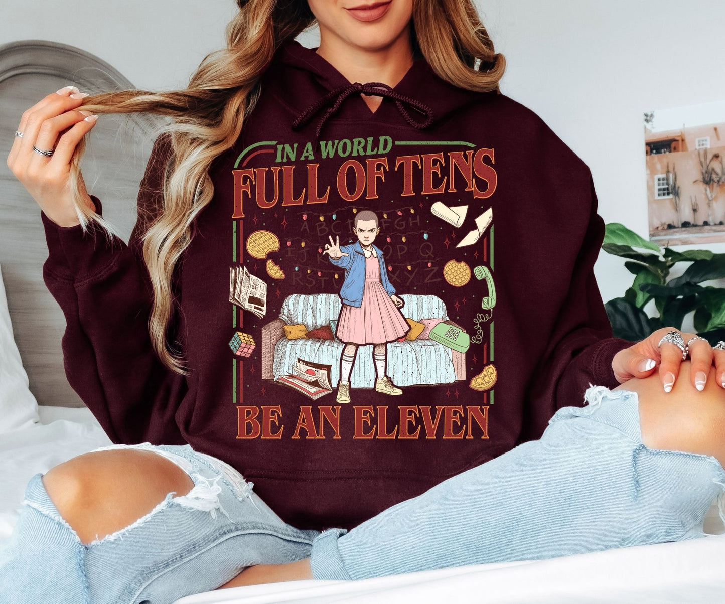 In a World Full of Tens Be an Eleven Hoodie – Retro Sci-Fi Quote Graphic Hoodie, Funny Motivational Unisex Sweatshirt